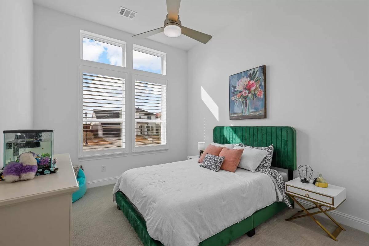 Check Out the Vibrant Green Headboard in This Bright Bedroom