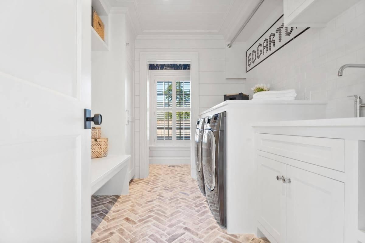 Craftsman Laundry Room with Brick Herringbone Floor