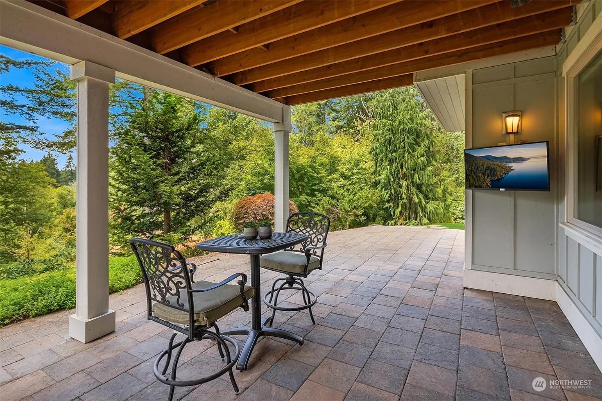 Experience Outdoor Dining Under the Cover of a Craftsman Porch