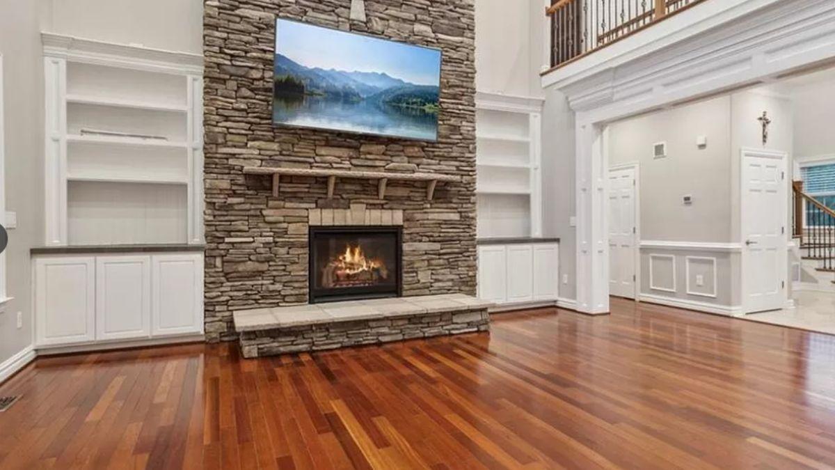 Wow, Check Out This Living Room with Its Striking Stone Fireplace Wall