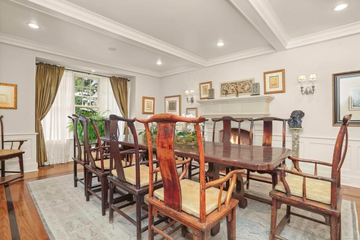 Discover the Timeless Elegance of This Craftsman Dining Room with a Grand Fireplace