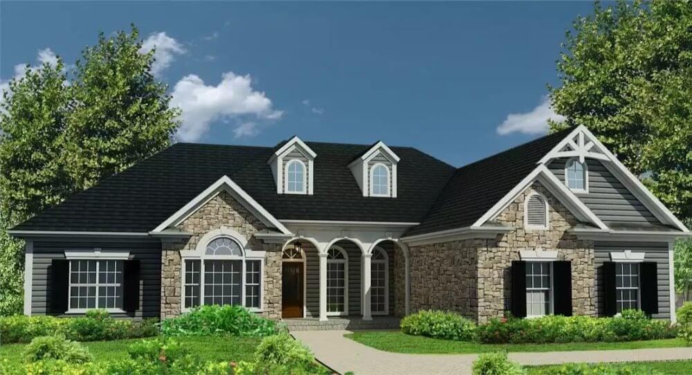 Charming Farmhouse with Stone Accents and Dormer Windows