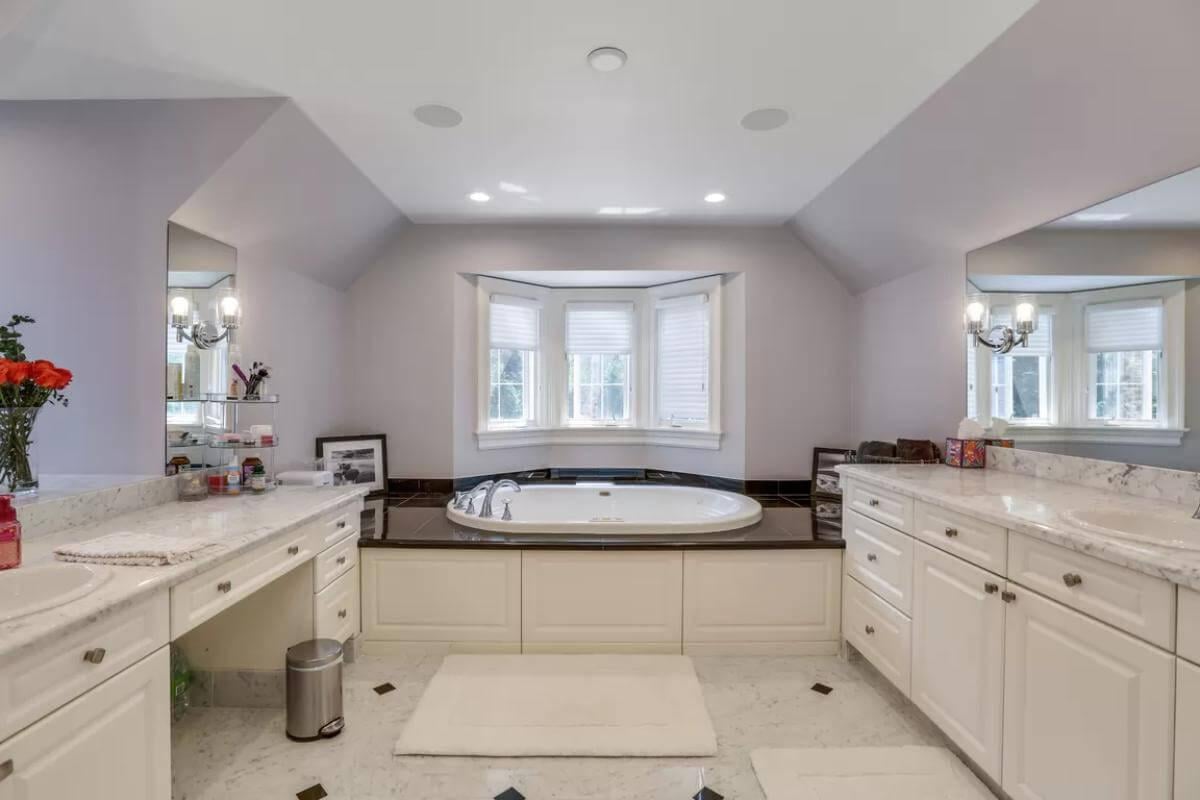 Spacious Bathroom with a Soothing Bay Window Tub