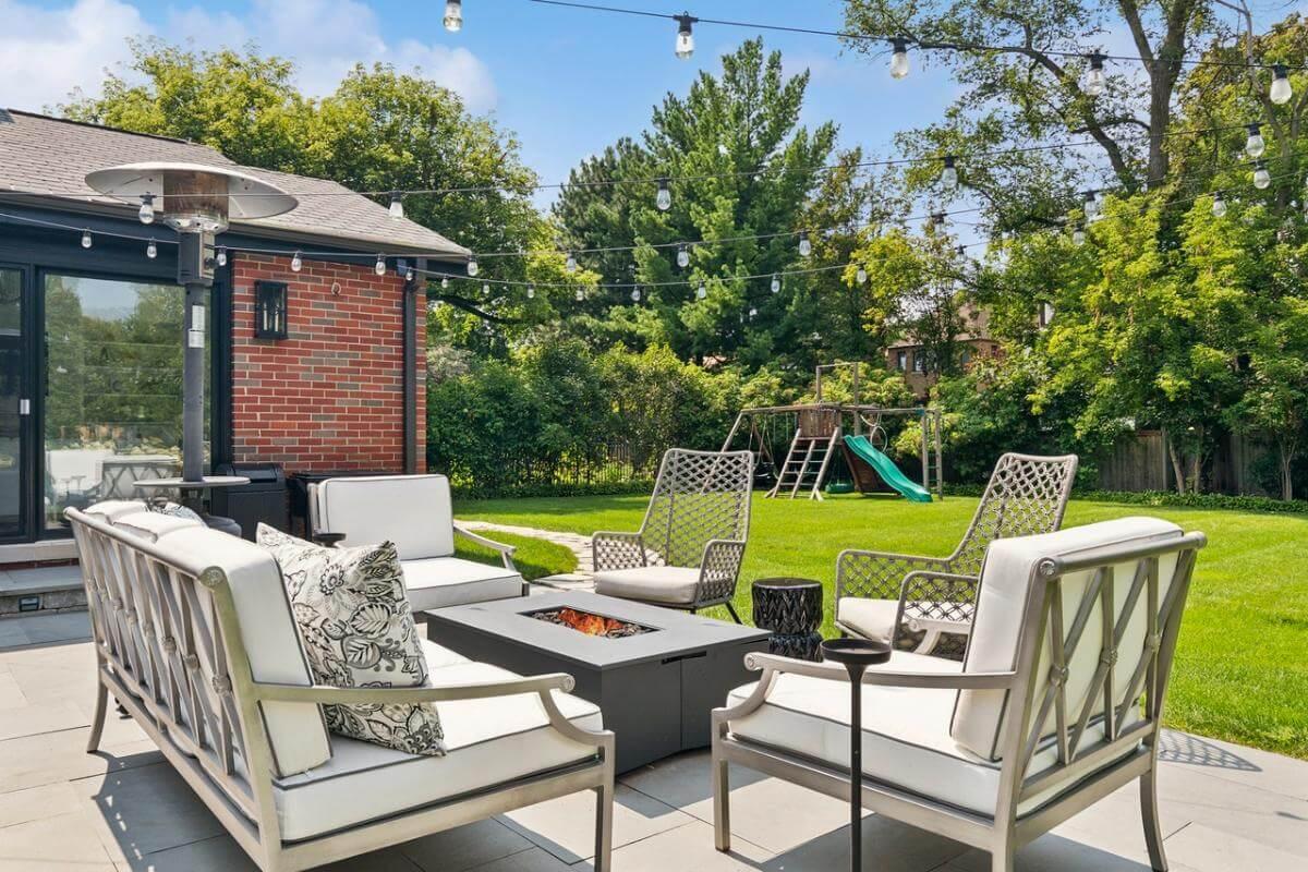 Backyard Retreat with Cozy Fire Pit and String Lights