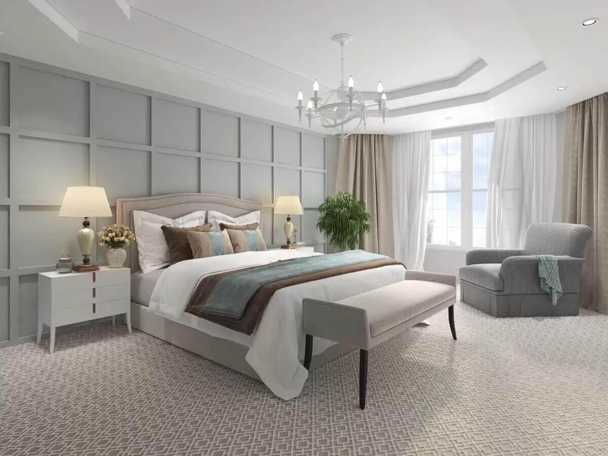 Luxurious Bedroom with Geometric Wall Paneling and Relaxation Corner