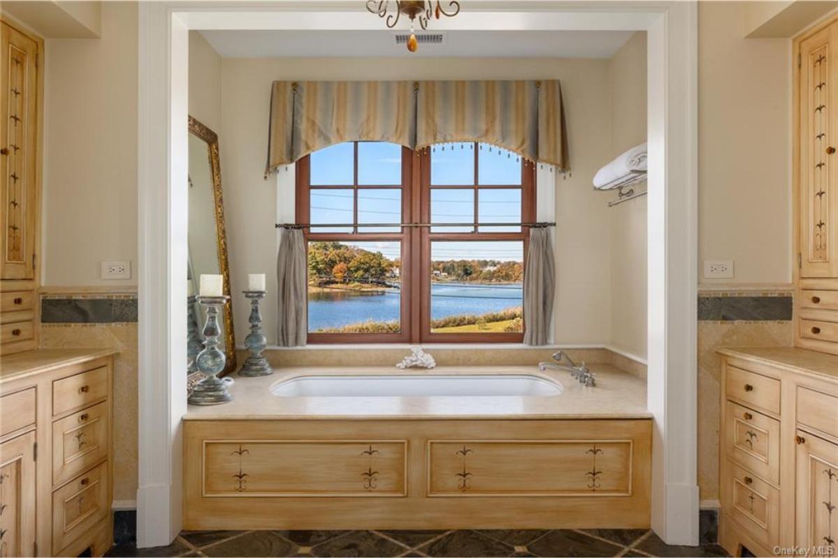 Enjoy a Tranquil Bath with Stunning Lake Views