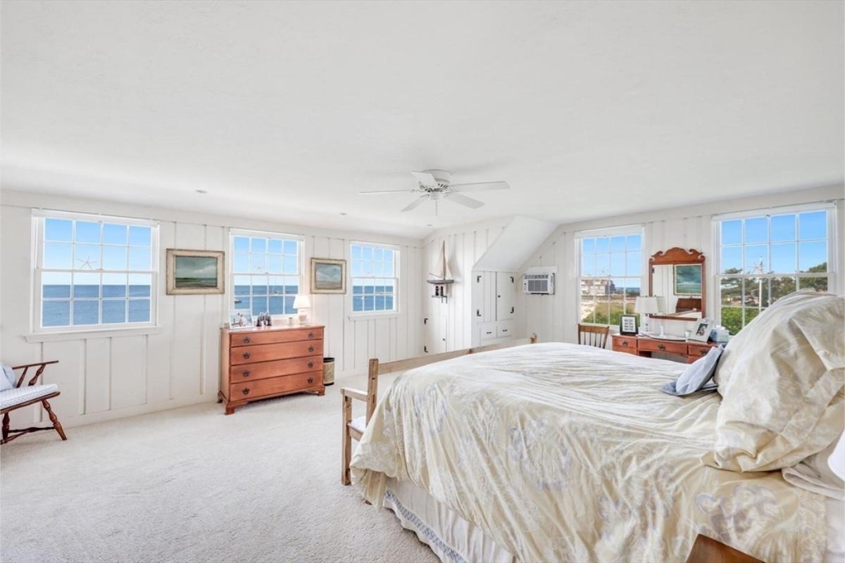 Coastal Bedroom with Stunning Ocean Views and Vintage Touches