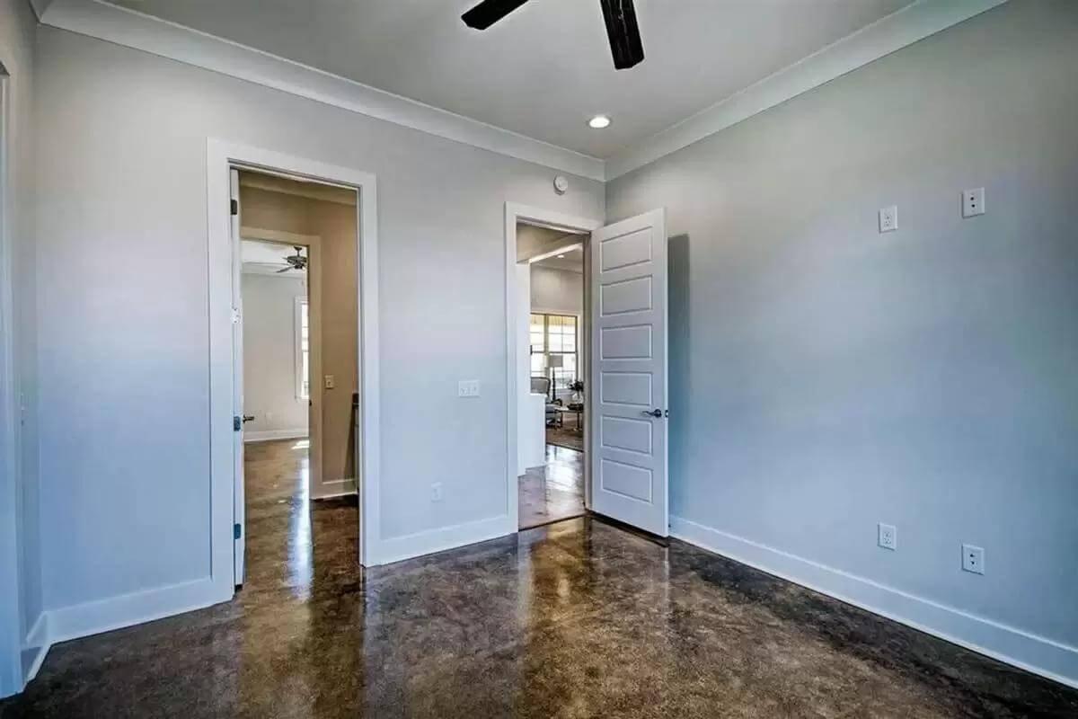 Minimalist Elegance with Polished Concrete Floors and Modern Touches