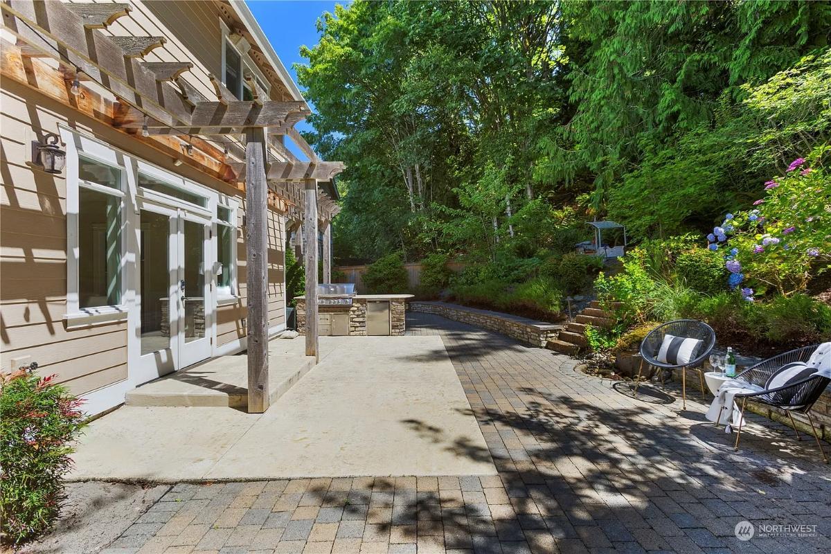 Unwind Under the Pergola in This Tranquil Patio Oasis