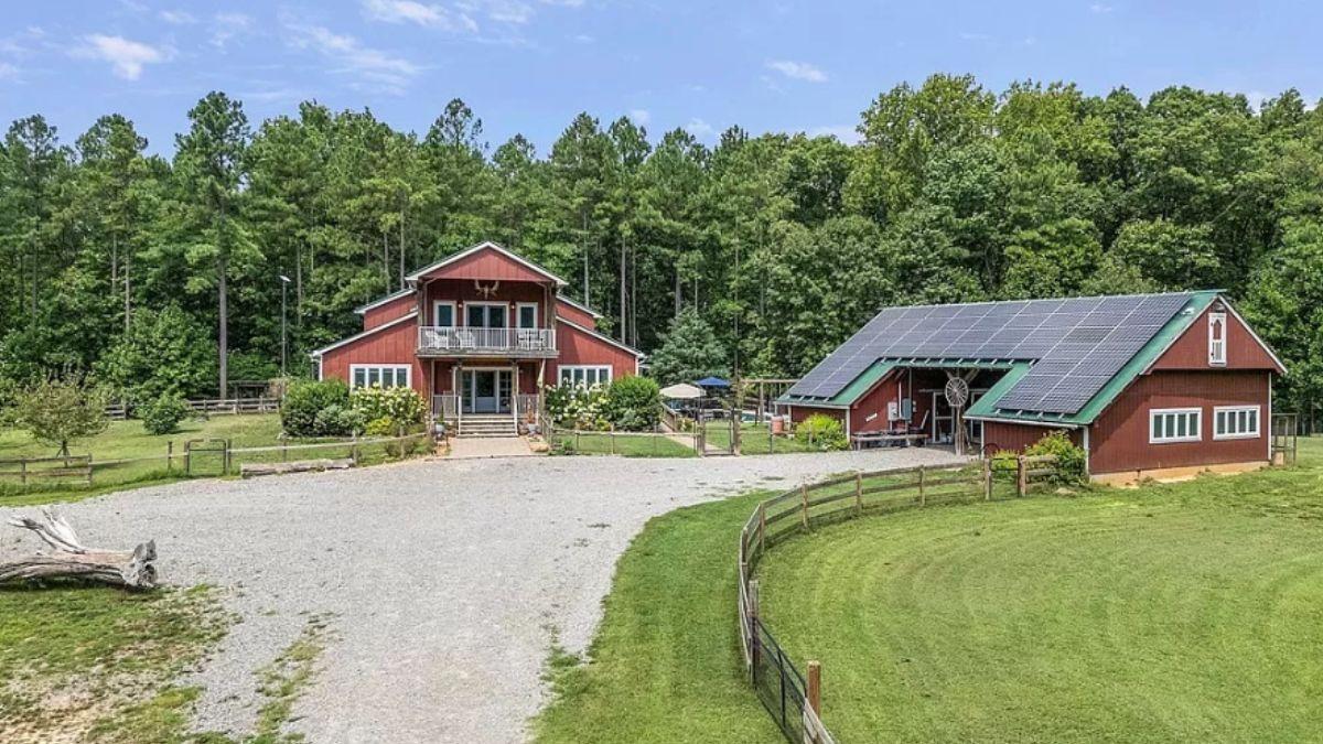 Admire the Solar-Powered Outbuilding Beside the Distinctive Red Farmhouse