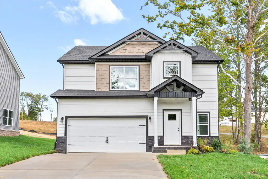 Modern Farmhouse  4-Bedroom Home with Covered Patio and Double Garage (1,720 Sq. Ft. Floor Plan)