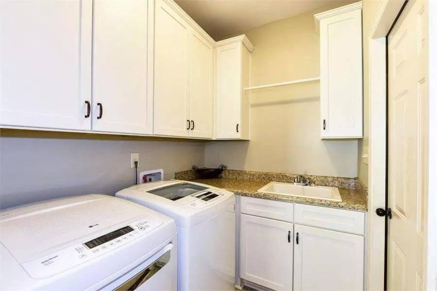 Clever Storage Solutions in This Compact Laundry Room