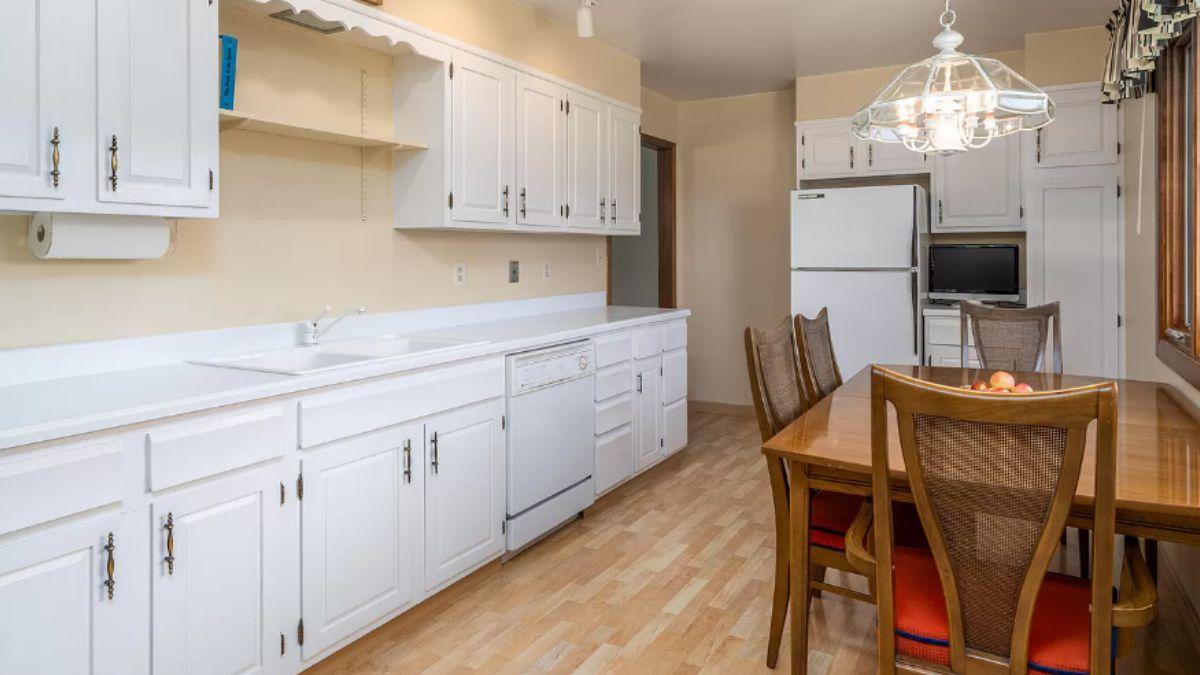 Traditional Kitchen with White Cabinetry and a Handy Eating Nook