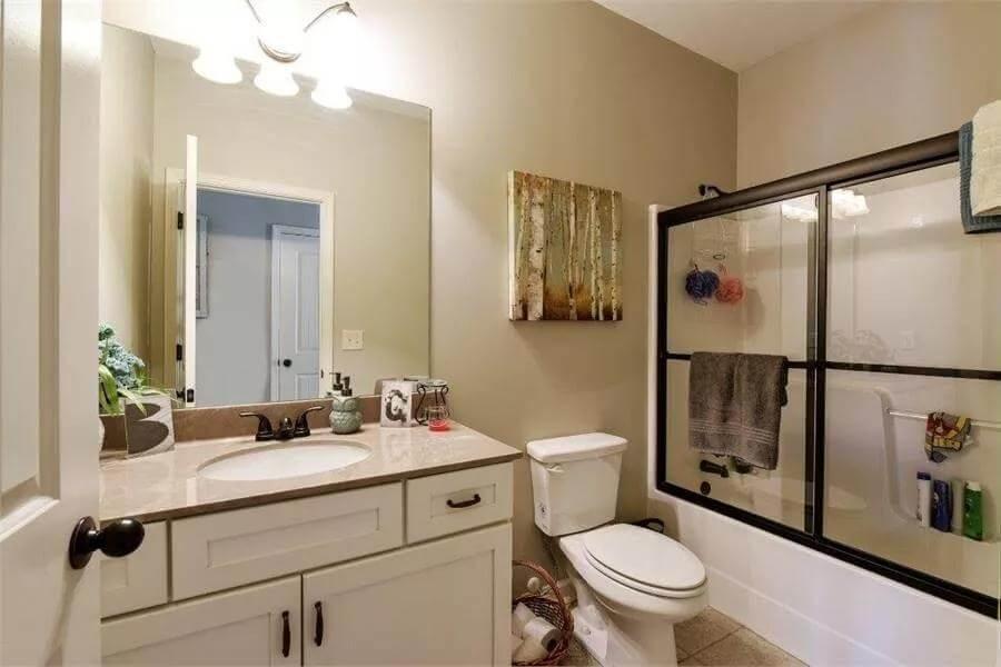 Notice the Nature-Inspired Art in This Craftsman Bathroom
