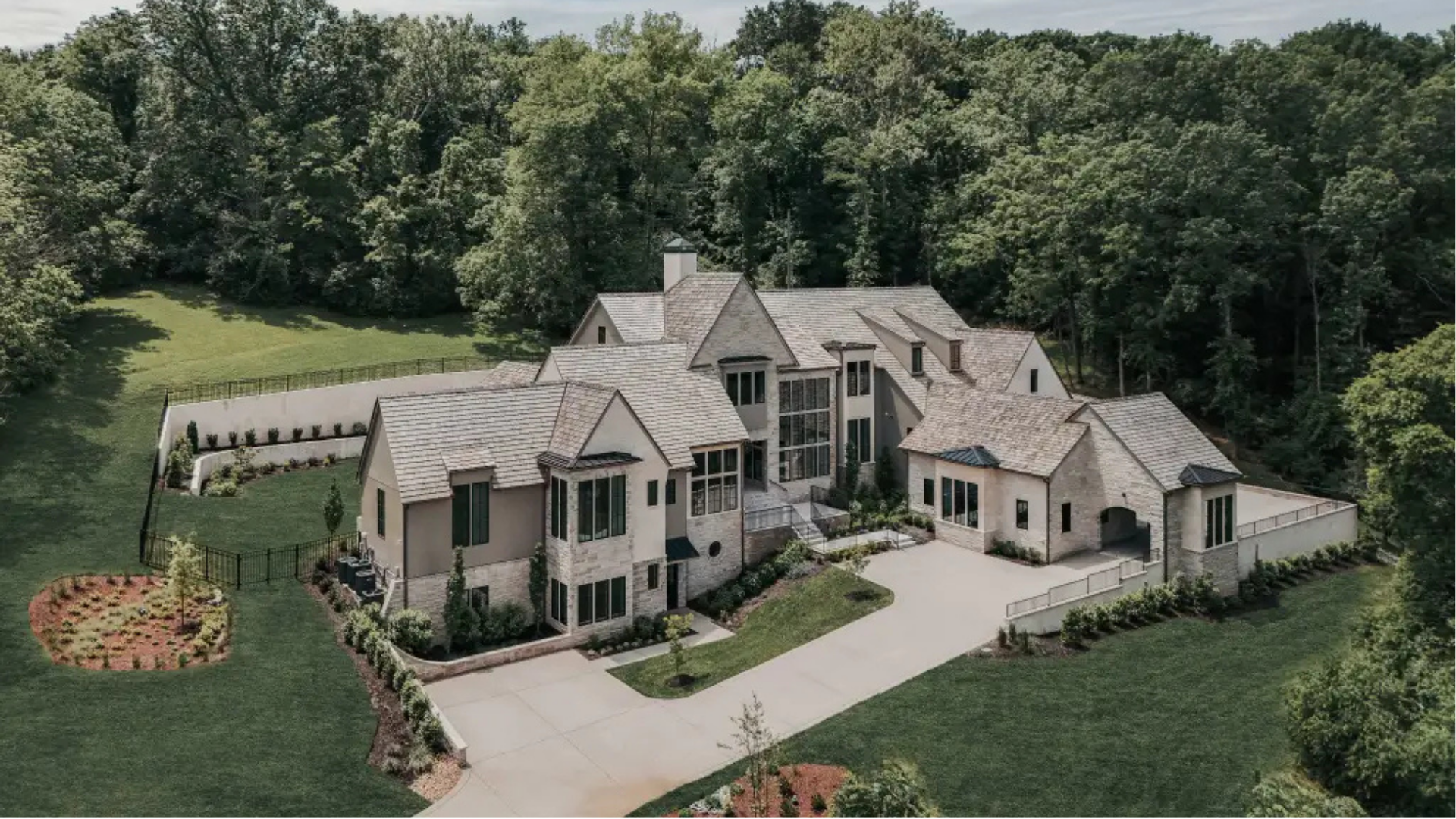 Explore this 12,157 Sq. Ft. Estate in Nashville, Tennessee, Featuring a Private Bowling Alley, Five Garage Bays, and Serene Outdoor Living