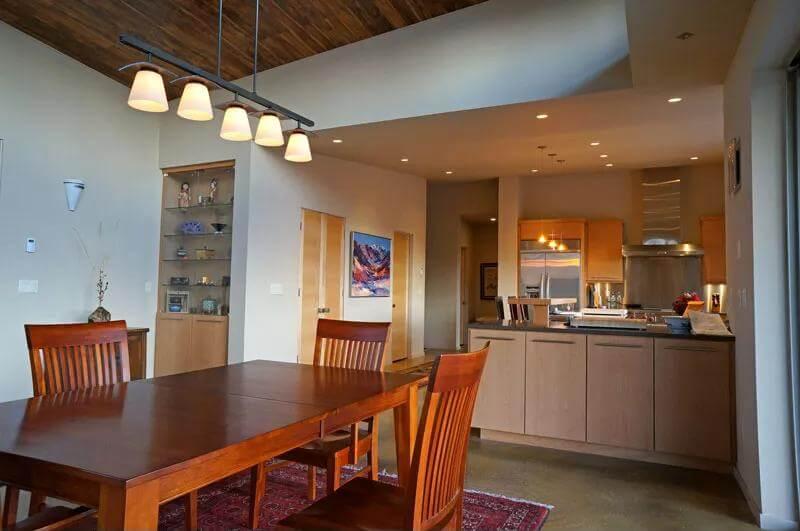Notice the Seamless Transition from Dining Area to Modern Kitchen