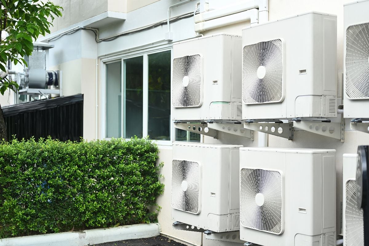 Multiple ac units outside the house.