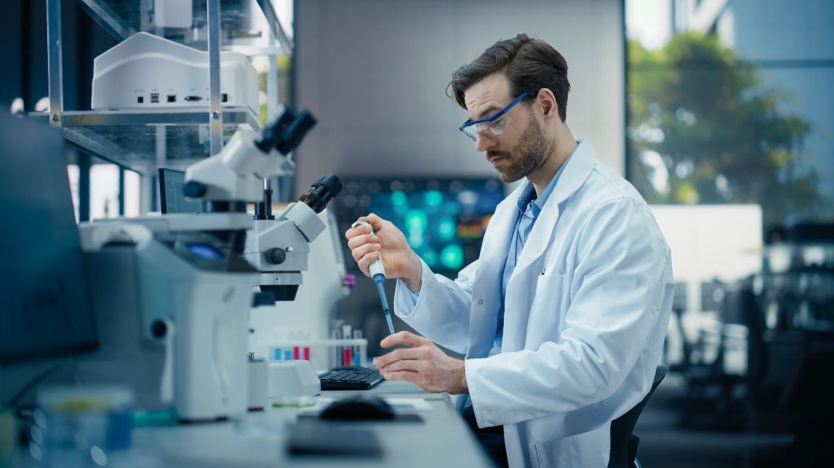 Scientist working with samples in a biotech laboratory.