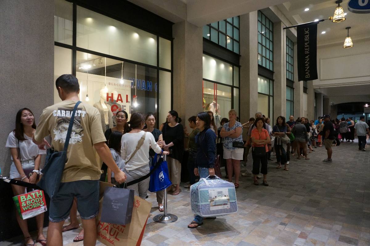 Crowd of People in line at mall on Black Friday outside Banana Republic.