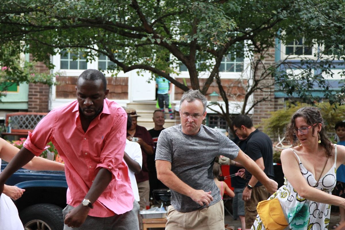 People dancing at the block party.