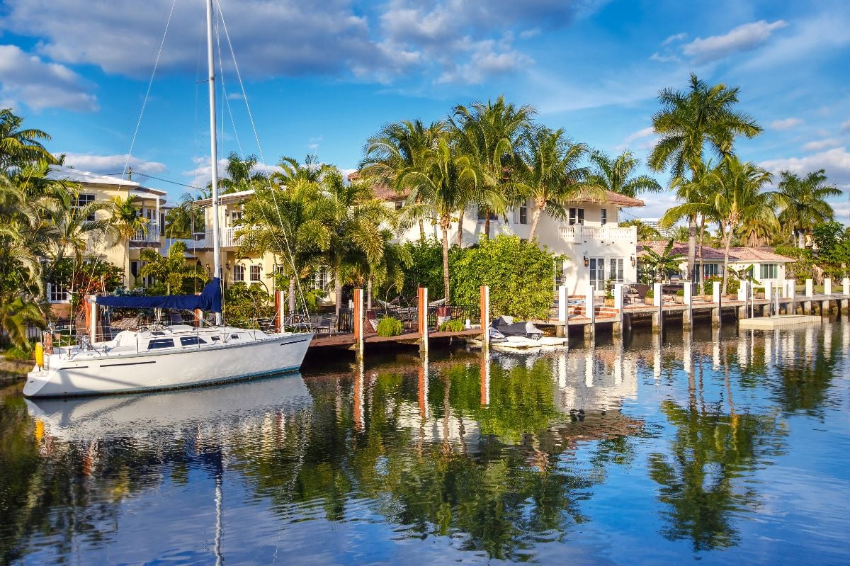 Boat in waterfront homes.
