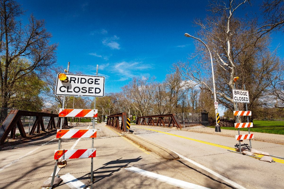 Bridge with closed road signs in Pittsburgh.