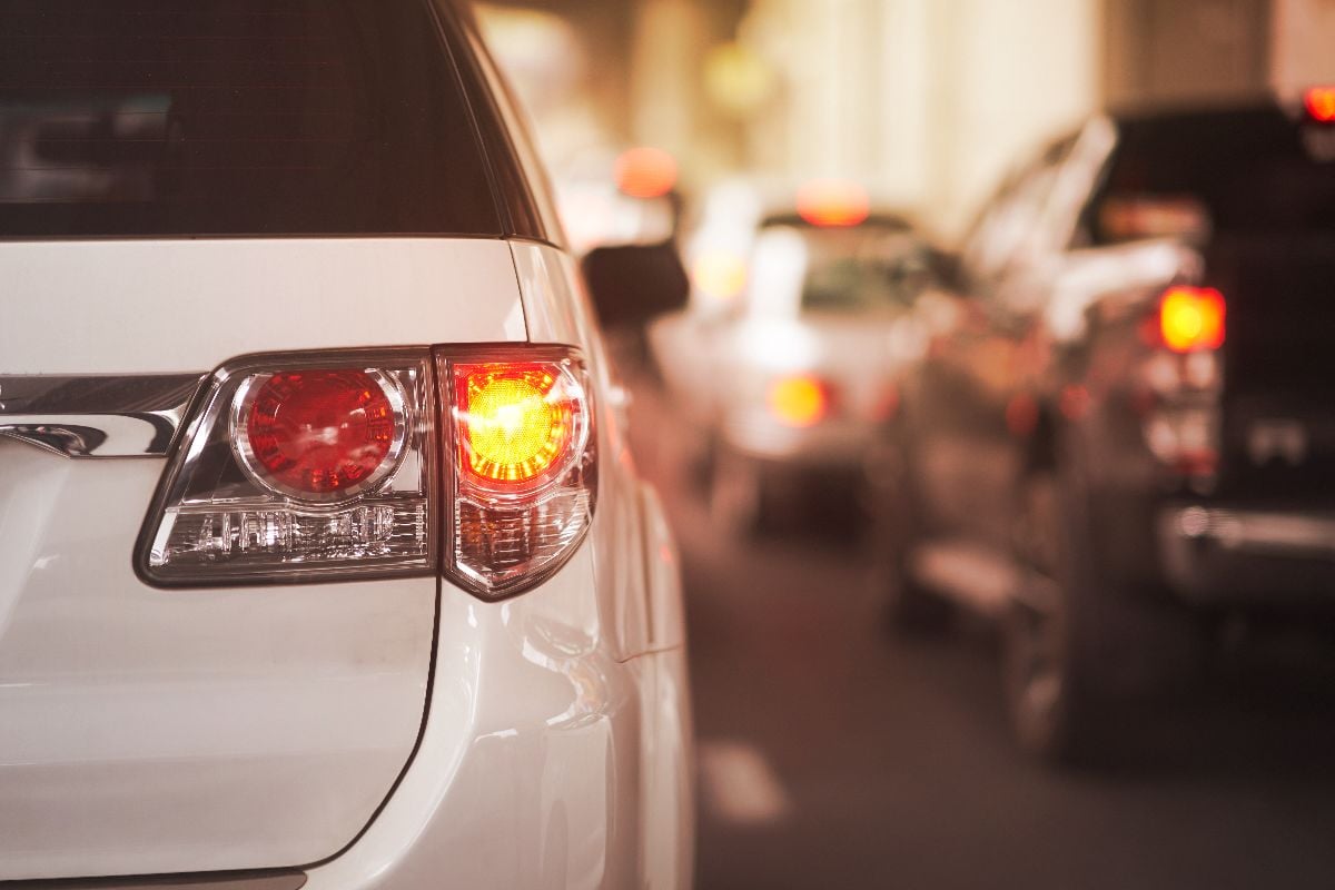 Rear lamp signals on street.