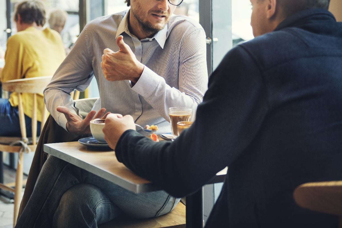 Businessmen meeting in a coffee shop.