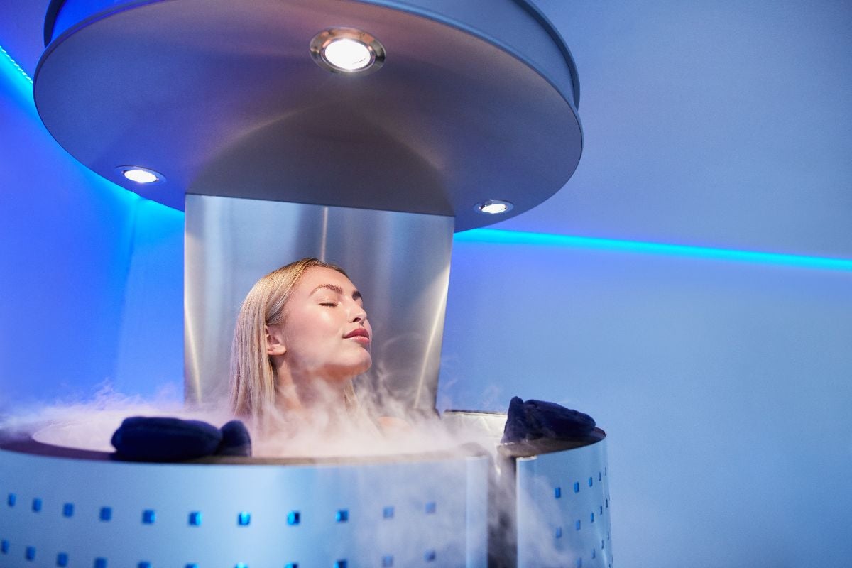 Woman getting cryo therapy at the cosmetology clinic.