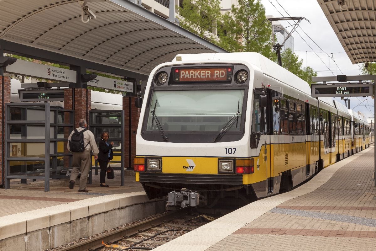 Dallas Area Rapid Transit (DART) train arriving at the station.