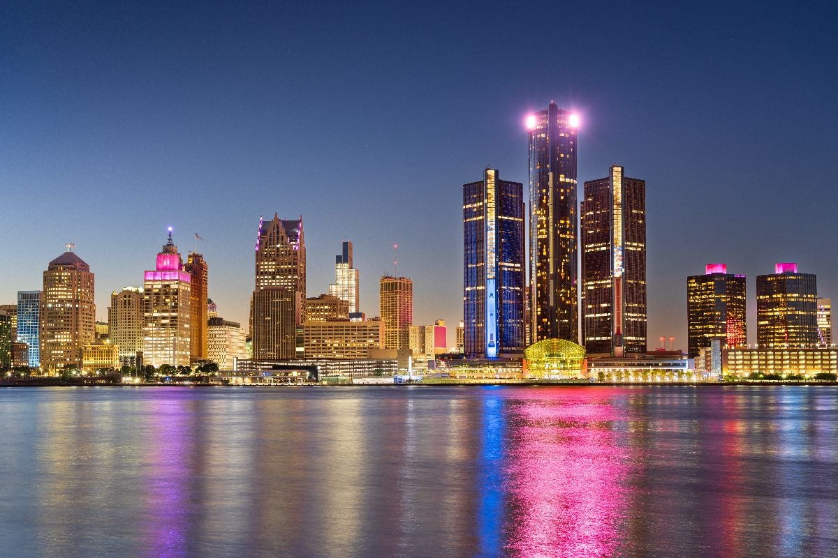 Detroit, Michigan, USA skyline at dawn on the Detroit River.