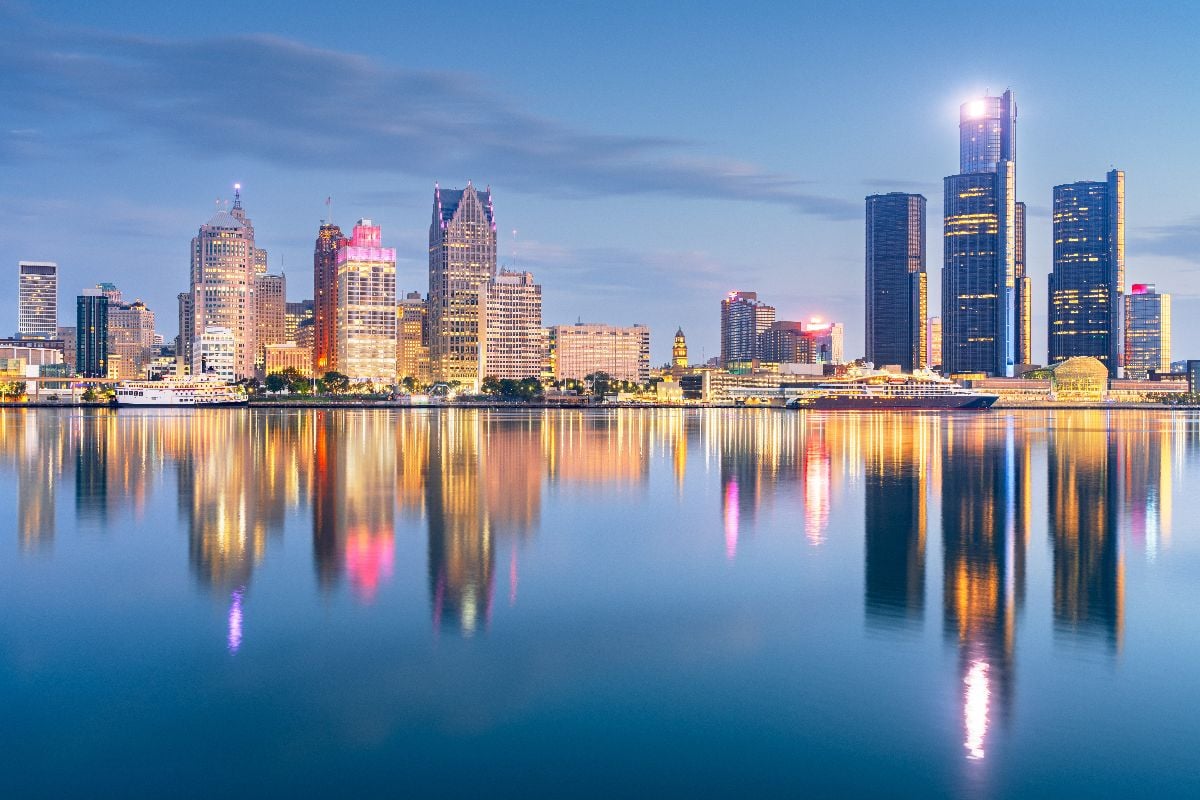 Detroit, Michigan skyline at dawn on the Detroit River.