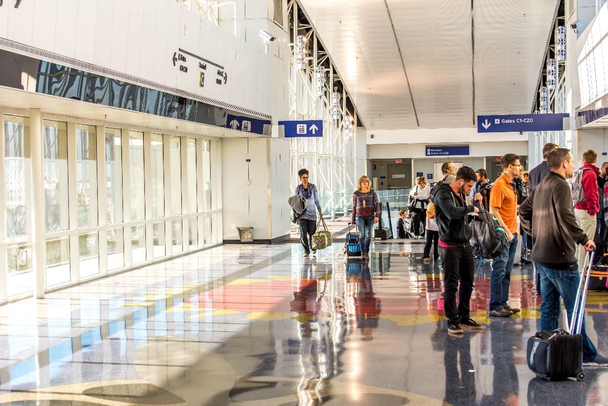 Passengers waiting for the Skylink train in DFW airport.