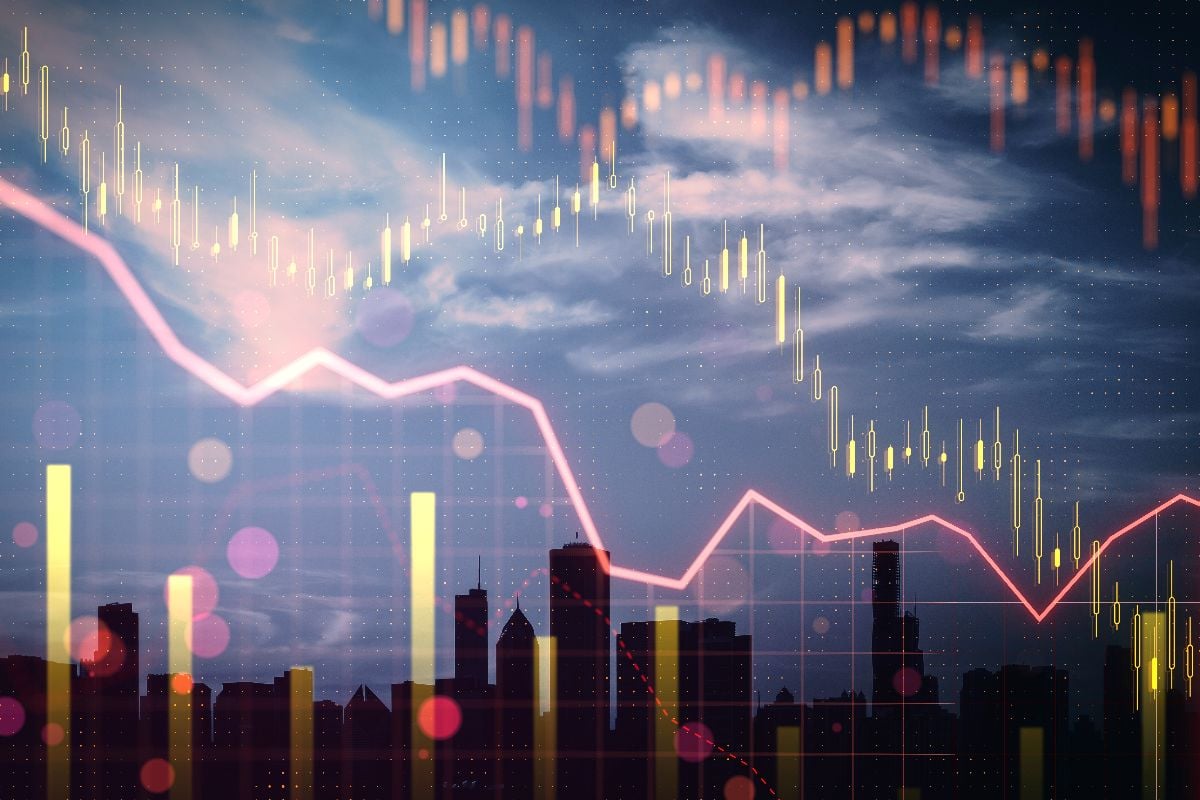 Financial graphs over a city skyline.