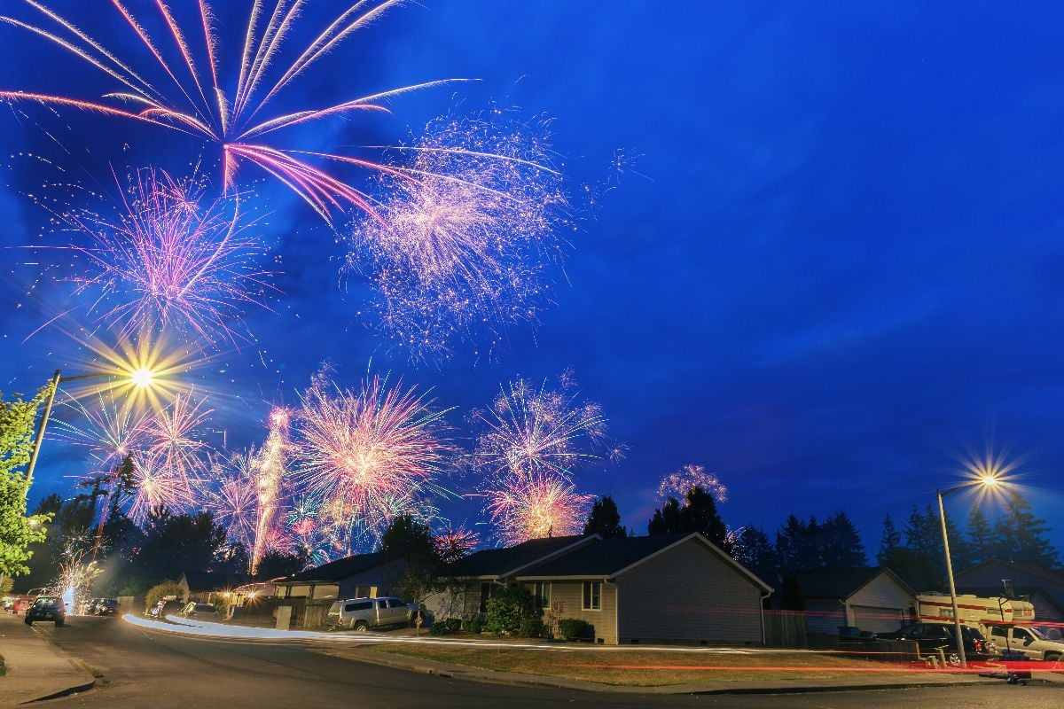 Fireworks at night in the neighborhood.