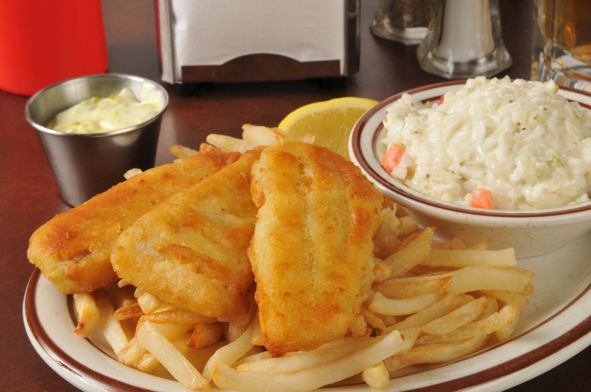 Fish fry with fries and coleslaw.