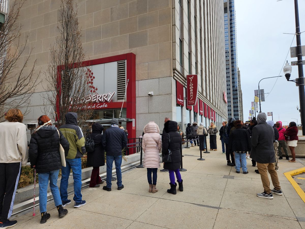 People waiting in line outside of Wildberry restaurant.