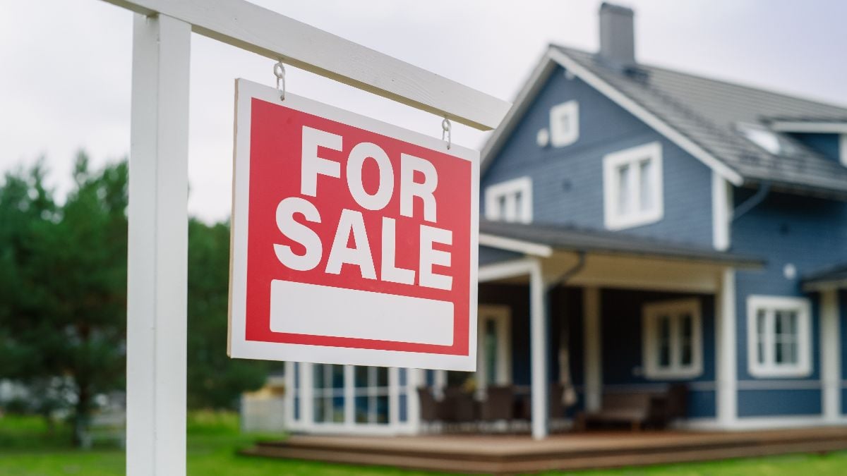 Close up of a red real estate property for sale.