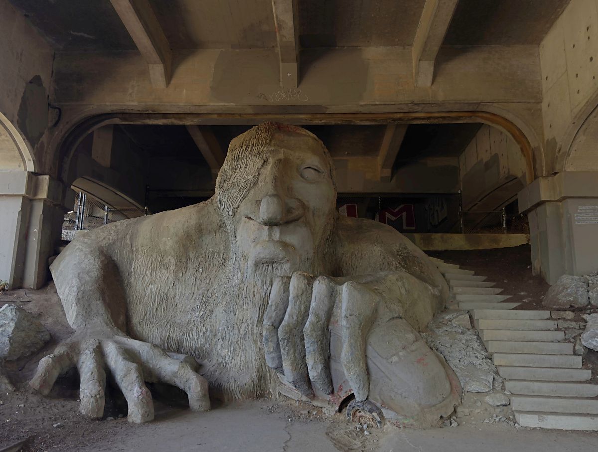 iew of the Fremont Troll sculpture under the Aurora Bridge.