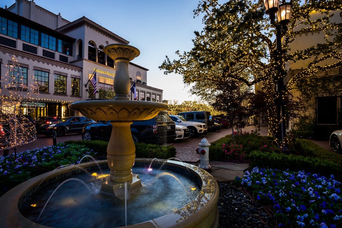 Highland Park Village in dusk.