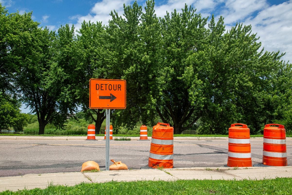 Road construction with a detour sign.