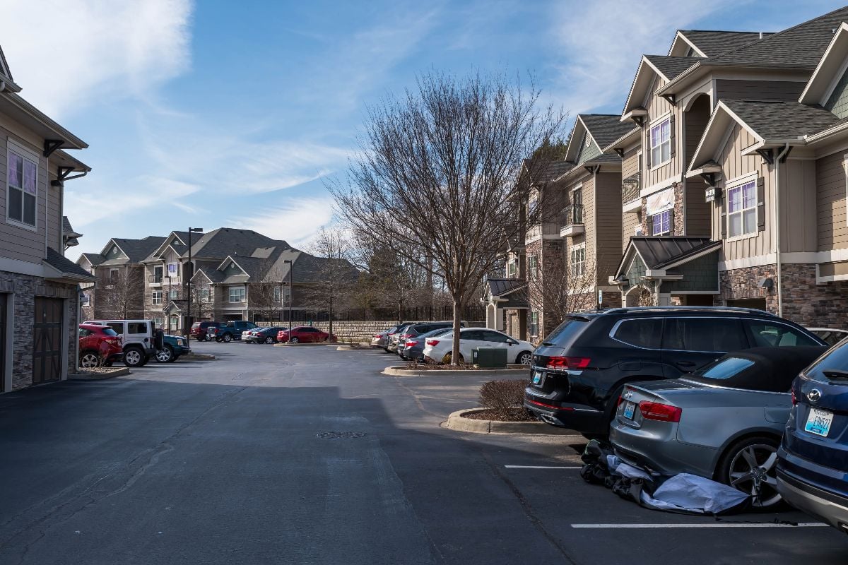 Parking lot and buildings in the Clairborne Crossing apartment complex.