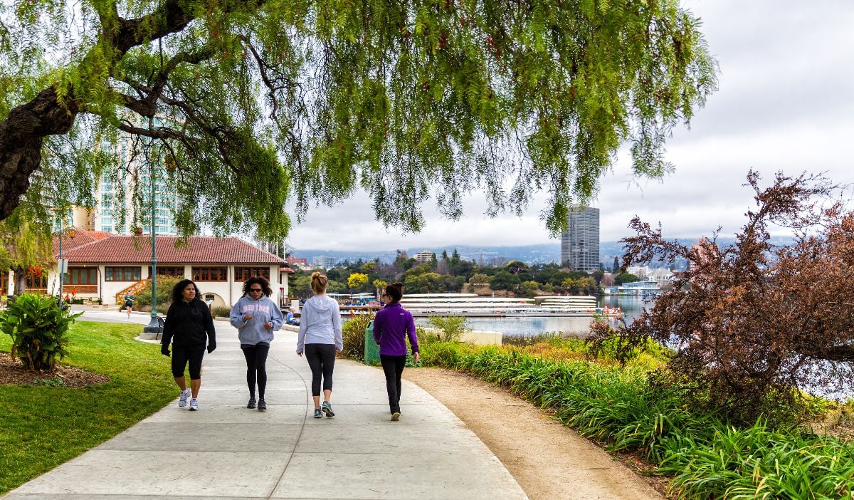 People on pedestrian path around Lake Merritt in downtown Oakland.