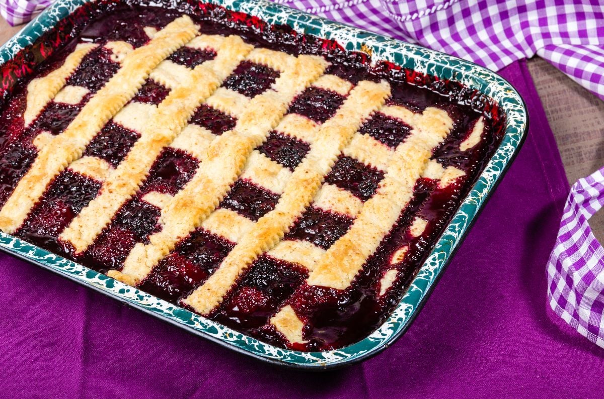 Fresh homemade marionberry cobbler in a pan.
