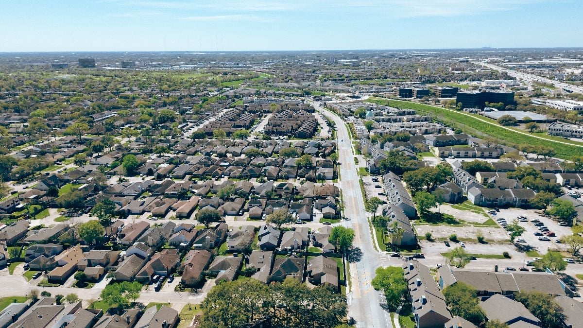 Mixed use development area with apartment complex, residential houses, business park, industrial warehouse building