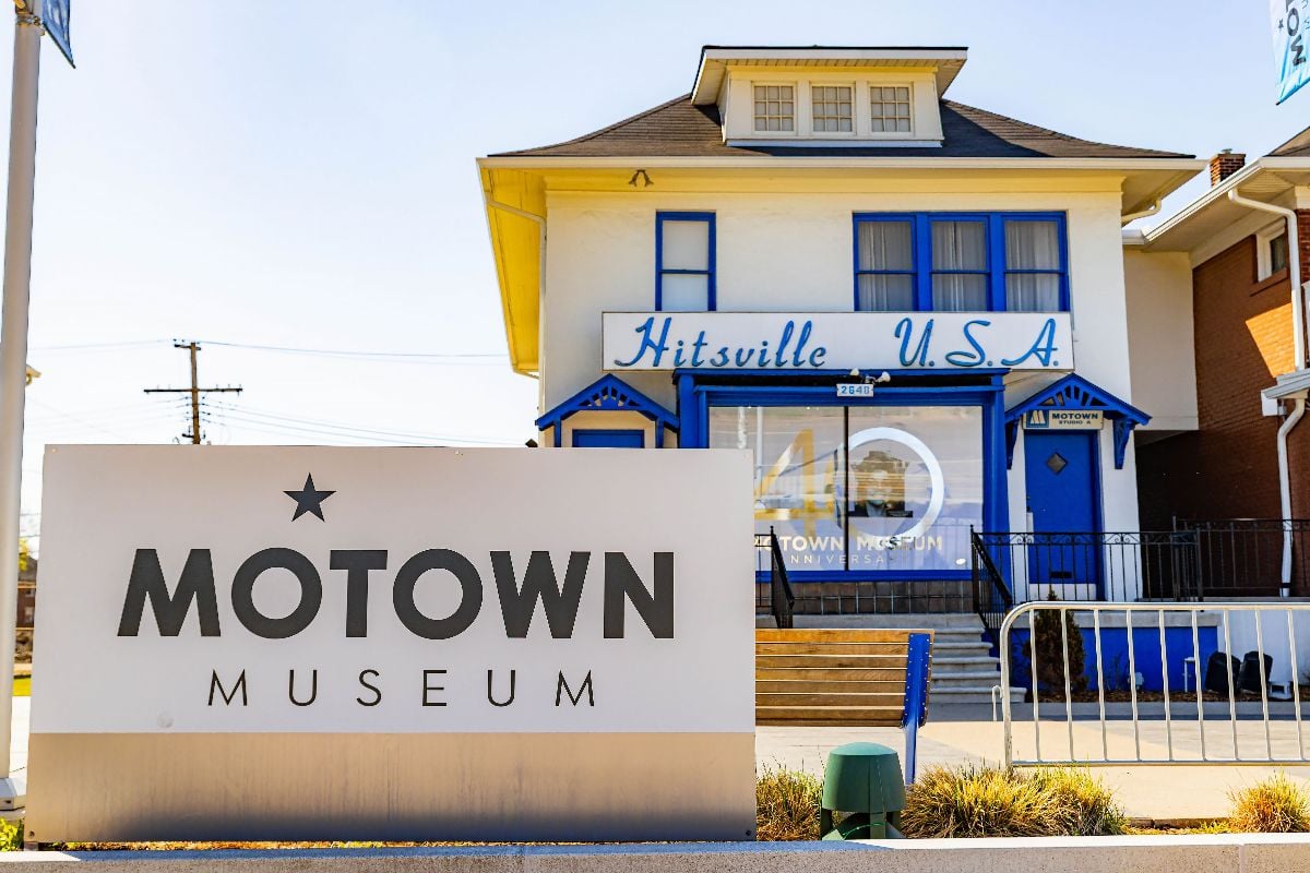 Blue Motown Museum building in Detroit, Michigan, featuring the iconic "Hitsville U.S.A." sign.