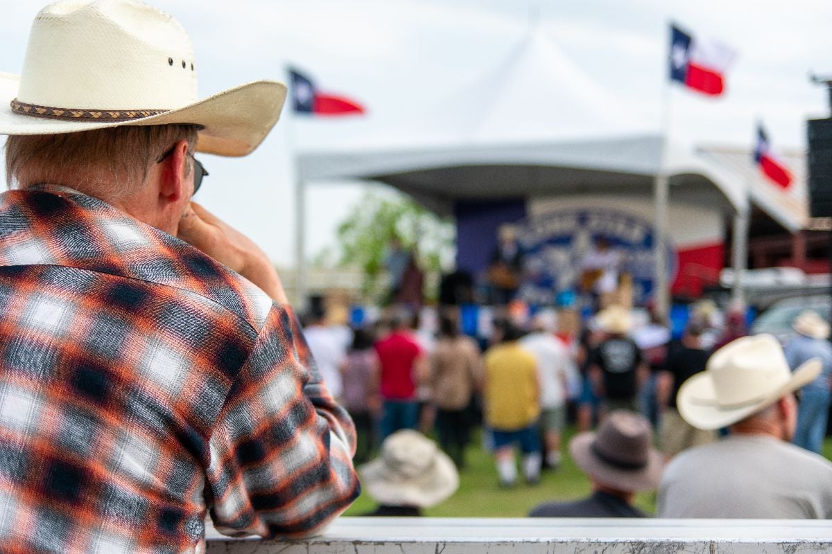 A spectator watching a live band.