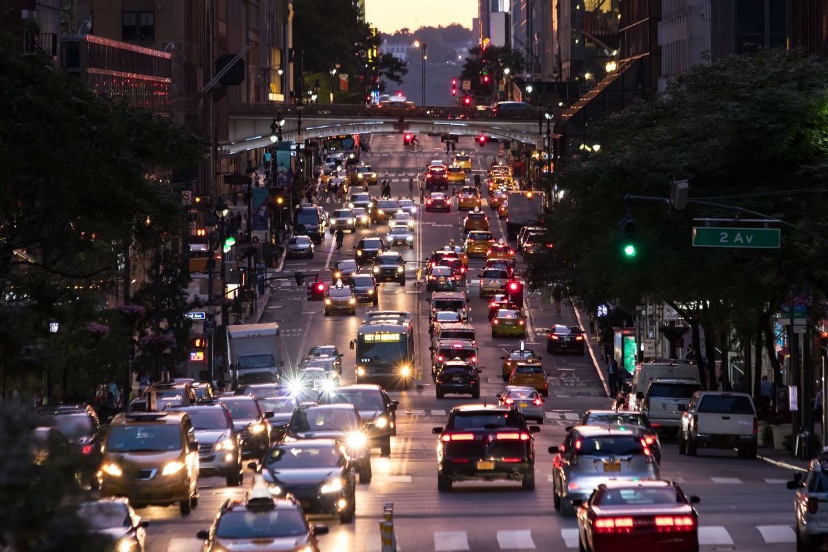Lights from crosstown traffic on 42nd Street in Midtown Manhattan New York City.