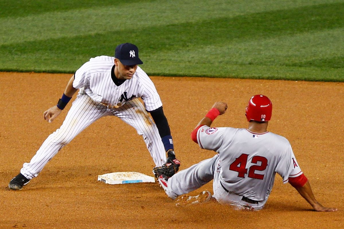 New York Yankees shortstop Derek Jeter tags out Los Angeles Angels left fielder Vernon Wells during the fourth inning.
