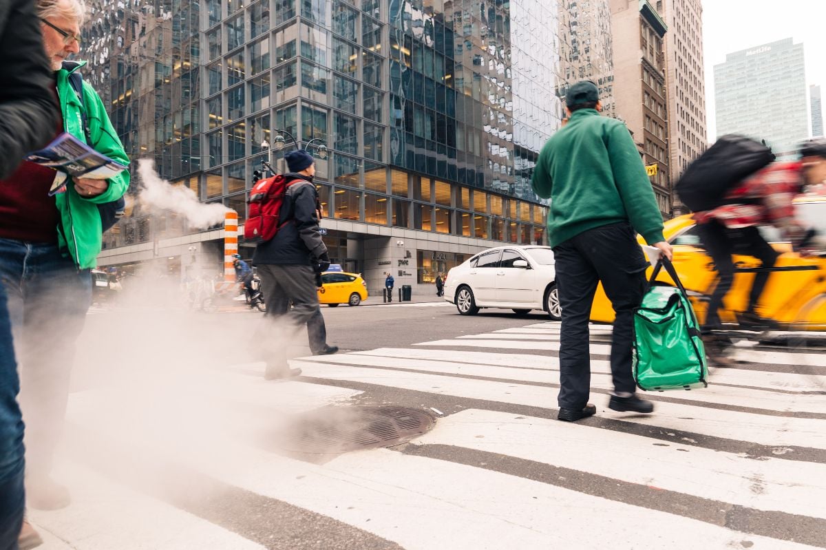 Steam from street underground on Manhattan Central Street.